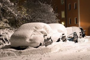 car with thick snow on it